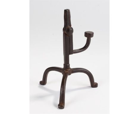 Early 19th Century rush light candle holder, circa 1800, the scissor action hinged holder with three wide arched legs with pa