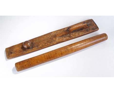18th Century Scandinavian chip carved mangling board and original roller, the board with a raised handle to one end, the oppo