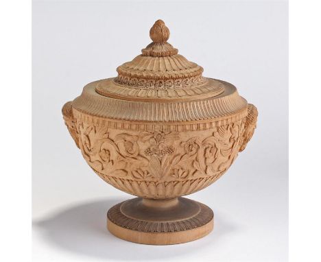 Finely carved early 19th Century Scandinavian birchwood lidded urn, the turned and carved urn with leaf finial above an arche
