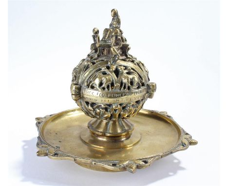 19th Century Anglo-Indian brass inkwell, with a figural and foliate pierced top, dish base, 23cm wide