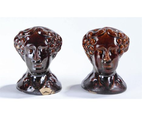 Pair of 19th Century saltglaze sash window stops, in the form of Women’s heads, (af) 12cm high, (2)