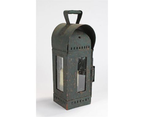 Large 19th Century lantern, the green painted lamp with arched top, glass sides, carrying handle to the top, 43cm high