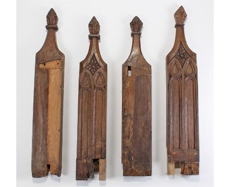 Two pairs of 19th Century Gothic revival pew ends, two with a foliate top and deep panel sides, with two plain examples, 117c