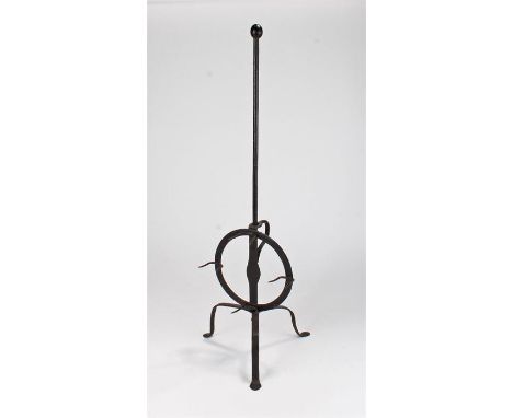 18th Century iron lark spit, the long column with ball finial, circular adjustable pronged platform rasied above three cabrio