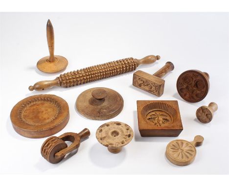 Victorian moulds, various examples, together with a roller example and a rolling pin example (qty)