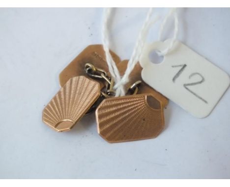 A pair of 9ct. engine turned cufflinks 4g.     