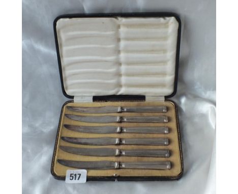 Boxed set of six tea knives with beaded handles    