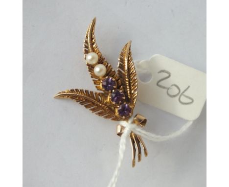 9ct. pearl and amethyst set fern brooch, 1.75” long 4.2g.  