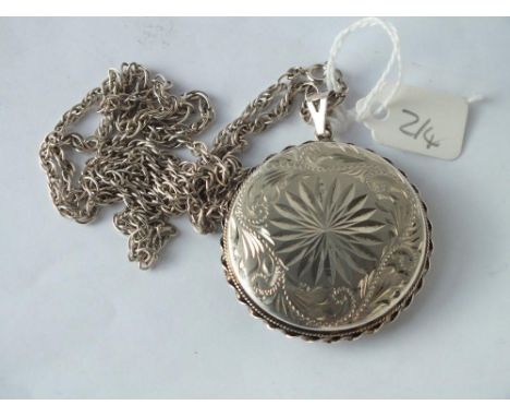 Large silver locket engraved with foliage, 1.75” dia. on chain  