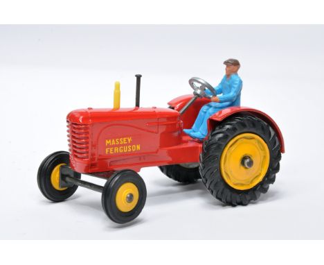 Dinky No. 300 Massey Ferguson Tractor. Single issue is in red, yellow hubs, and rubber tyres, as shown. Displays generally ve
