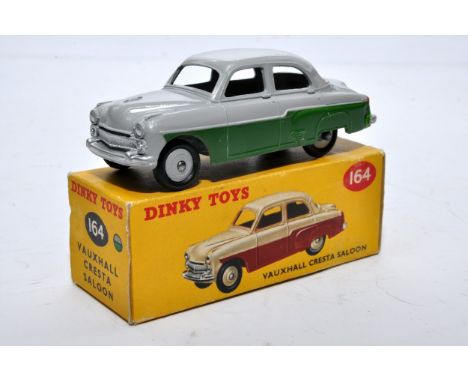 Dinky No. 164 Vauxhall Cresta Saloon. Single issue is in two-tone grey and green, with grey hubs, as shown. Displays generall
