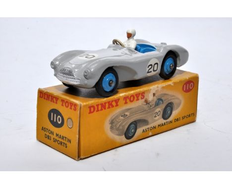 Dinky No. 110 Aston Martin DB3 Sports. Single issue is in grey, RN20 with blue interior, and blue hubs, as shown. Displays ge