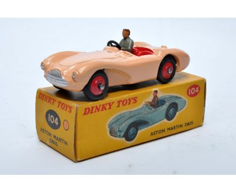 Dinky No. 104 Aston Martin DB3S. Single issue is in pink, with red interior, red hubs, plus driver, as shown. Displays genera