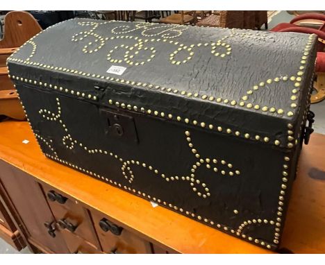 19th century leather covered brass studded domed top trunk, with original blue paper lining. 67x38x37cm approx. Initials J B.