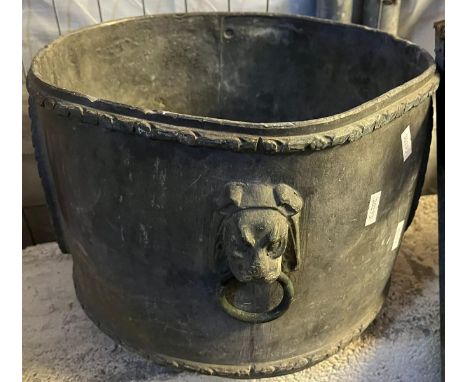 Straight sided lead garden planter, with lion mask mounts and paw feet. 30cm diameter approx. (B.P. 21% + VAT).&nbsp;No holes