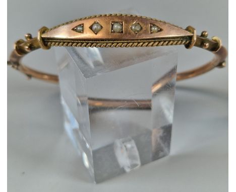 9ct gold bangle inset with five pearls. 8.3g approx.  (B.P. 21% + VAT)