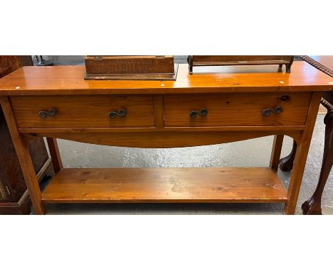 20th century pine two drawer side table with under shelf in Spanish style. 150x40x76cm approx. together with a similar style 