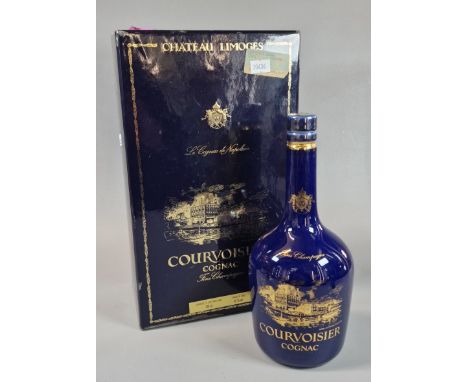 Bottle of Chateaux Limoges Courvoisier Cognac Fine Champagne, in porcelain decanter and original box with COA. Full and seale