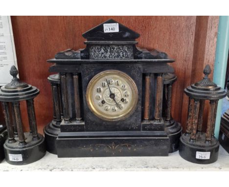 19th century black slate architectural two train temple shaped mantel clock with two multi column supporters. (3)  (B.P. 21% 