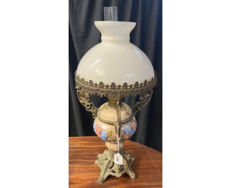 Yellow metal and pottery double burner oil lamp with opaque glass shade and chimney. (B.P. 21% + VAT)