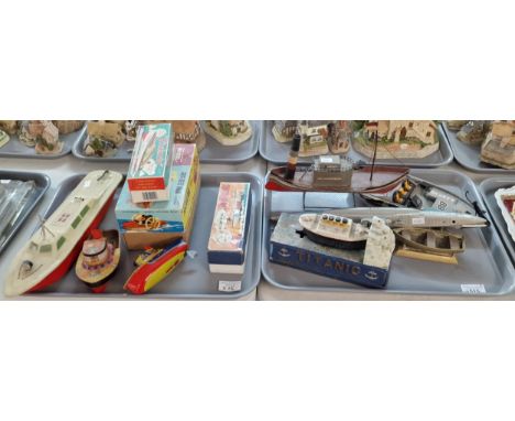 Two trays of assorted toys to include: tin plate Harbour Tug and other boats, Victoria Steam Powered Engine boat Popeye tin s