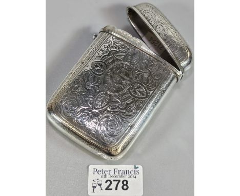 Victorian ornate engraved silver cigar case, presented by M Thomas to J Edwards Price Esq. 1881. Hallmarked for Birmingham 18