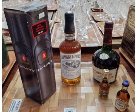Collection of alcohol to include: Taylor's Late Bottled vintage Port, Southern Comfort, Courvoisier Cognac and two miniature 