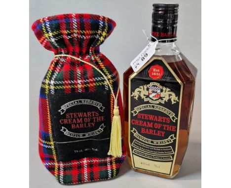 Bottle of Stewarts Cream of the Barley Special Reserve Scotch Whisky, in tartan bag. 75cl.  (B.P. 21% + VAT)