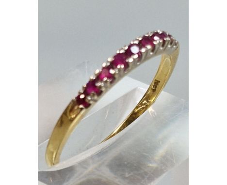 18ct gold and ruby eternity style ring. 1.8g approx. Size O1/2.  (B.P. 21% + VAT)
