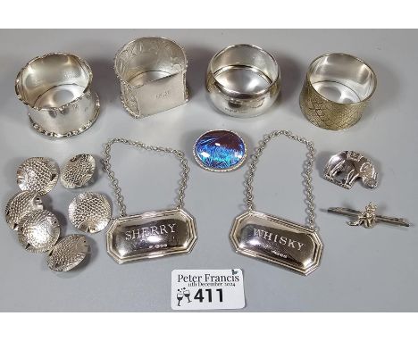 Small collection of silver and white metal to include: napkin rings, sherry and whisky decanter labels, fish buttons, silver 