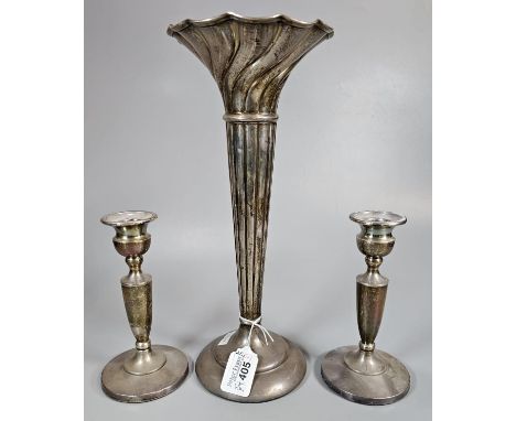 Silver writhen trumpet vase on loaded base with rubbed hallmarks. 30.5cm high approx. together with a pair of silver baluster