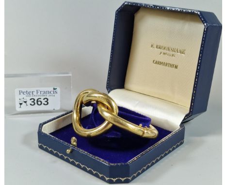 18ct gold modernist twist design ladies' bangle, in fitted box. 48g approx.  (B.P. 21% + VAT)