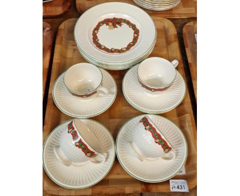 Fourteen piece Wedgwood Queen's Ware Christmas Time part tea set, comprising: cups, saucers and side plates. (B.P. 21% + VAT)