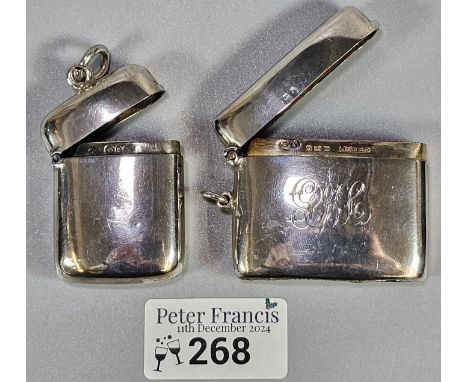Two silver vesta cases of plain form, one with engraved initials, both Birmingham hallmarks. Total weight 2.05 troy oz approx