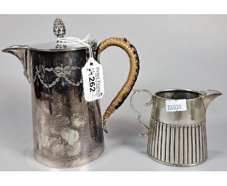 Silver fluted cream jug. Birmingham hallmarks. 3.2 troy oz approx. Together with a silver plated conical water jug with cane 