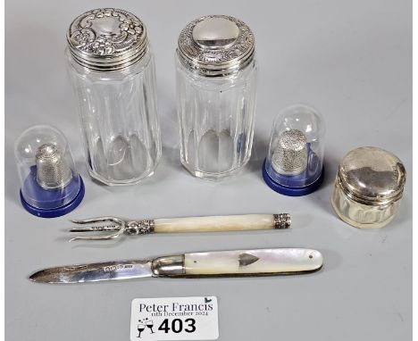 Collection of Victorian/Edwardian silver topped glass dressing table jars, together with two silver thimbles, silver and moth