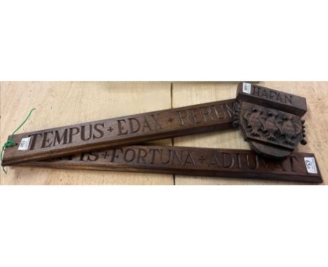 Three carved signs with Latin and Welsh script including: 'Hafan',(haven or harbour-Welsh), 'Tempus Edax Rerum' (time devours