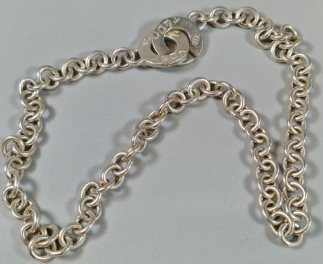 Tiffany &amp; Co silver curb-link necklace with double circular pendant marked 925 T &amp; Co. 1.43 troy oz approx. (B.P. 21%
