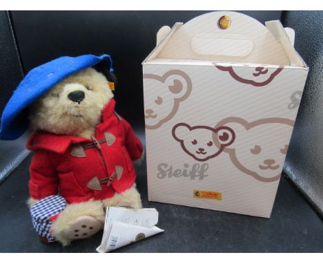 Steiff Paddington Bear with his marmalade and tag in original box and in original Steiff paper bag with a stand