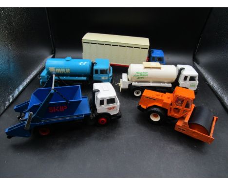 Britains lorries- White milk tanker, blue milk tanker, Ford skip lorry, Dynapac CA25 heavy road roller, Iveco transport truck