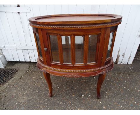 Hardwood oval drinks cabinet H76cm W80cm D50cm approx&nbsp;