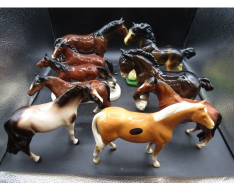 8 assorted ceramic horse figurines&nbsp;