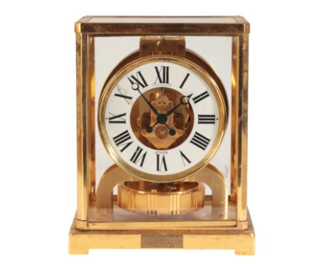 JAEGER-LECOULTRE: A SWISS 'ATMOS' CLOCK the dial with Arabic and baton numerals, inscribed "Jaeger-LeCoultre, Atmos", in a fi