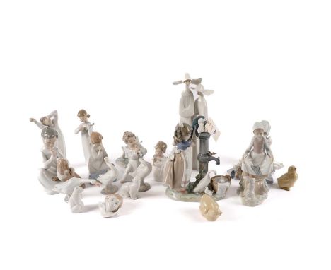 A collection Lladro and Nao figures, including: two nuns, 33cms high; ‘Rabbits Food’; ‘Summer on the Farm’; ‘My Hungry Brood’