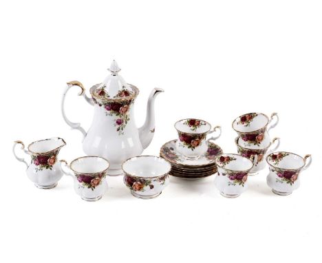 A Royal Albert ‘Old Country Roses’ pattern tea service, comprising: a tea pot, a sugar bowl, a cream jug, and six teacups and