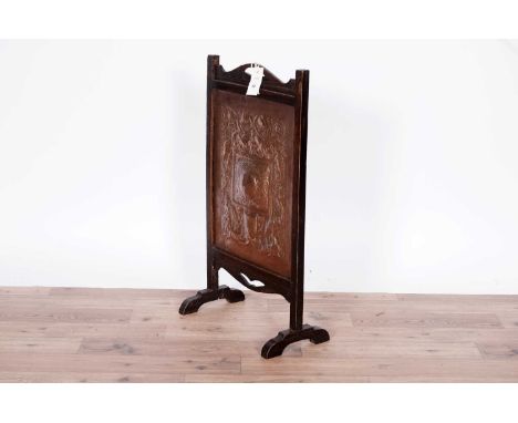 Attributed to W.H.Mawson of Keswick: An Arts &amp; Crafts firescreen, the copper panel with central repousse foliate scroll c