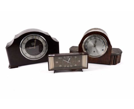 Two Art Deco mantle clocks in walnut and Bakelight; and a mid-Century Coral alarm clock. (3)