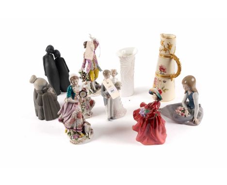 A selection of decorative ceramics, including: a Royal Worcester tapered ewer, with floral and gilt decoration on a cream gro