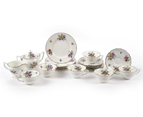 A Royal Worcester ‘Abla’ pattern tea service, comprising: teacups, saucers, side plates, a twin handled sugar bowl with cover