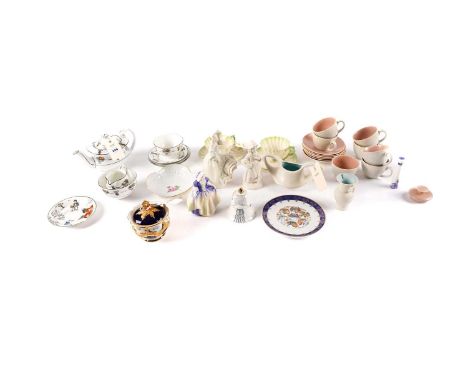 A collection of ceramics, including: a Meissen sugar bowl, with gilt and flower designs, circa 1930; two Belleek ‘Neptune’ cu